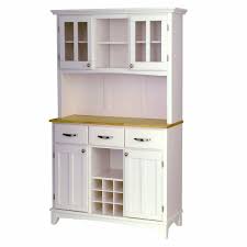 Simple linear design blends a slender black frame with tempered glass shelving. Traditional China Cabinets Birch Lane