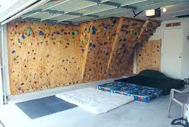 Rock climbing is a fun activity that's also extremely taxing physically, making it perfect for a garage gym. The Hahn S Homebuilt Climbing Wall In Our Garage Home Climbing Wall Diy Climbing Wall Indoor Climbing Wall