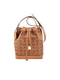 Sie passen super zu einem eleganten outfit mit schicken damen overkneestiefeln. Mcm Tasche