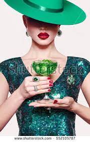 Girl In A Green Hat With A Cocktail In Hand Green Party Dress Absinthe Ice Green Party Dress Green Hats Party Dress
