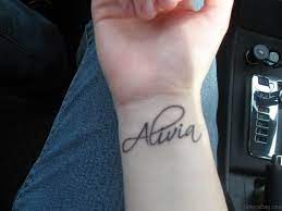 The tattoo is made to appear as if one is wearing a bracelet on their hand. 70 Interesting Name Tattoos On Wrist