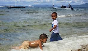 Give them beach shovels and buckets. Kids Playing Beach Outdoor Young Children Play Philippines Pikist