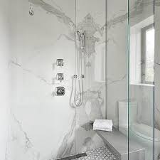 With many styles to choose from, you'll appreciate the versatility and uniqueness of marble. Gray Quartz Waterfall Shower Bench Bathroom Shower Walls Bathroom Remodel Shower Shower Wall