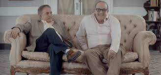 Two of the four chairs are a rich, dark leather, while the other two are a brown velour. Find Films Interfilm Berlin
