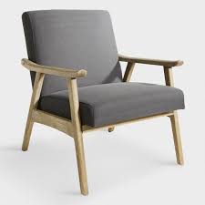 with a nod to mid century aesthetic this armchair brings a modern mindset to your living space its ch living room chairs armchair comfy living room furniture