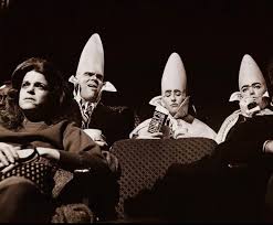 The Coneheads” — The Sketch That Was Out of This World Saturday Night Live,  1977. The lights rise. And there they are: three aliens with towering  cone-shaped heads, sitting in a movie