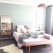 The mix and match darker bed linen is offset by paler semi circles of colour on the bedroom wall and headboard. Blush And Grey Bedroom Interior Home Decor Bedroom Pink Bedroom Design
