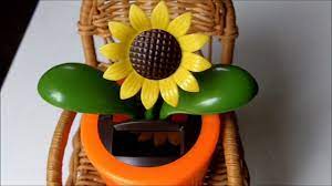 Turning a flower basket into a solar chandelier is easy and inexpensive. Solar Sunflower From The Dollar Tree Cool Toy Youtube