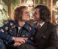 Flamboyant, iconic elton john is as much part of the american musical landscape as he is in his native england. In Rocketman 2019 Elton John Taron Egerton Kisses John Reid Richard Madden Richard Madden Elton John Taron Egerton