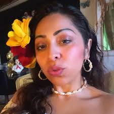 Band of sisters. Julieta and I, the original Kowalski girls.Wearing my  favorite long string of pearls today—bought them years ago in San Antonio.  One day, I lost them… then saw my sister