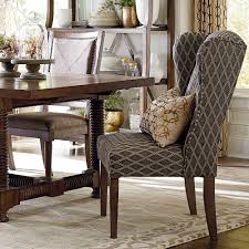 The neena upholstered dining chair features a transitional upholstered seat and back for a modern elegant feel. Alden Upholstered Dining Wing Back Arm Chair