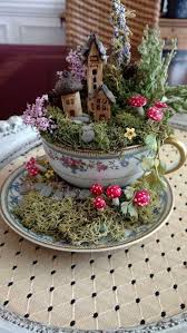 31 Delightful Teacup Mini Garden Ideas To Add Bliss To Your Home Fairy Garden Diy Fairy Garden Designs Fairy Garden Plants
