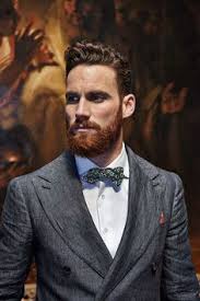 Even if your husband's entire family has brown hair, another gene for red hair could still be part of his genetic code—and therefore show up in unexpected places. Dark Hair Red Beard
