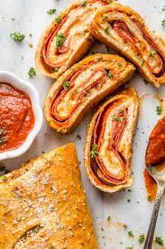 An Easy Stromboli Pizza Recipe Made With Soft Homemade Dough Loaded With Marinara Sauce Cheese Sal Stromboli Recipe Pizza Recipes Homemade Homemade Stromboli