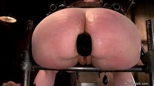 Big ass brunette slave Katharine Cane in device bondage gets butt plugged  and whipped then back waxed by masters Orlando and The Pope in dungeon -  XNXX.COM