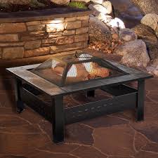 This old fire pit at torrance marriott in california gets a new lease on life when converted with ford blue base glass fireglass along with two 44 stainless steel h burners and remote control. Pure Garden Fire Pit Set Wood Burning Pit With Spark Screen Cover And Log Poker 32 Marble Tile Square Firepit Black And Orange Marbled M150074 Best Buy
