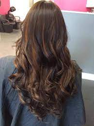 Of course, those short layers also contribute to its overall cool and carefree vibe. Dark Long Layered Hair With Highlights Novocom Top