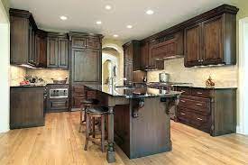 Are they more brown than green or red? Black Walnut Cabinets What Color Hardwood Floor With Dark Cabinets And Island Black Walnut Walnut Kitchen Cabinets Classic Kitchen Design Luxury Kitchen Design