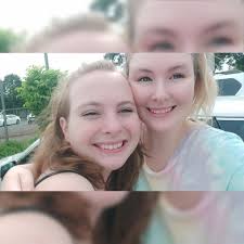 Request to edit photo of twin sisters with makeup and shirt color change