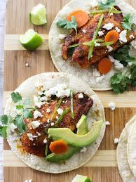 Sprinkle fish with salt and pepper and bake for ~25 minutes, or until fish is flaky. Spicy Fish Tacos Foodiecrush