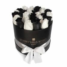 Any deliveries placed after midday will be delivered the next day. Cheap Flower Delivery Dubai Black White Roses In Elegance Send Roses