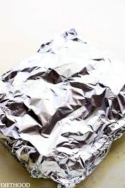 Wrap the tenderloin with one of these wrapping materials: Grilled Peach Glazed Pork Tenderloin Foil Packet With Potatoes