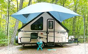 They are among the list of accessories that you have to find in order to enjoy you may also like. Amazon Com Versatility Teardrop Awning For Suv Rving Car Camping Trailer And Overlanding Light Weight Truck Canopy Durable Tear Resistant Tarp With 2 Sandbag Sports Outdoors