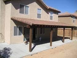 Adding A Permanent Roof To Your Patio Cover Allows You To Enjoy Your Patio Even When It May Be Raining Outdoors Pergola Plans Roofs Patio Pergola Patio