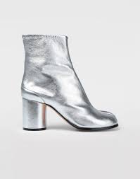Since margiela introduced an iteration of the tabi boot for men last season, they've been appearing on the feet of many a male — though that never stopped some from squeezing into smaller sizes before now. Maison Margiela Silver Tabi Boots Women Maison Margiela Store