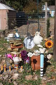 This Is From My Alice In Wonderland Garden That I Ve Created Alice Wonderland Garden Teacup Alice In Wonderland Garden Garden Theme Alice In Wonderland