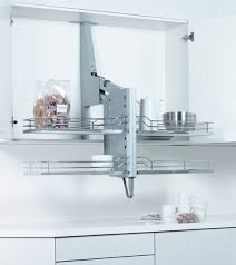This is an aventos hs servo drive door by blum on a cherry upper cabinet. Coolest And Most Accessible Kitchen Cabinets Ever Next Avenue
