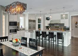 We're really digging the alternating black and gray stained wood cabinets in this devol kitchen. Lecy Bros Homes Remdoeling Kitchen Contemporary Kitchen Minneapolis By Lecy Bros Homes Remodeling