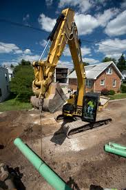 How To Safely Lift Loads With Excavators And Backhoe Loaders