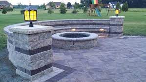 Our supplies are of the highest quality, our money saving strategies are realistic and powerful, and our customer satisfaction ratings can't be topped. Unilock Beacon Hill Flagstone Walnut Color With Unilock Estate Block Wall In Walnut Color With Il Campo Mocha Accent Bandi Patio Design Patio Remodel Backyard