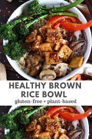Brown Rice Tofu Bowl Roasted Vegetables And Soy Ginger Garlic Sauce Recipe Rice Bowls Vegetarian Rice Bowls Healthy Healthy Recipes