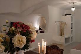 Growing flowers by candlelight in hotel rooms. Superior Suite With Private Pool Abelis Hotel