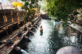 To initiate the water ritual with a character, they must currently be not hostile to you. The Tirta Empul Temple Purification Ritual At The Holy Water Temple Omnivagant