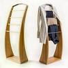 Wooden garment racks may have wood or metal frames with a wooden shelf built into the design. 1