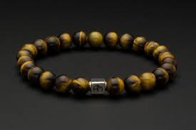For more information, call 800 843 3269. Yellow Tiger Eye Bracelet Mens Gold Bracelet Bead Bracelet Etsy