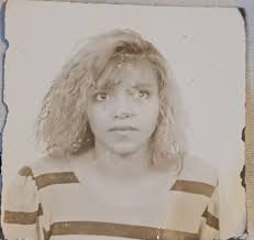 Good morning, all you talented people. Can some one sharpen this image and  possibly erase the face of the man