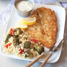 prepare this pan fried flounder with creamy lemon sauce for an easy comforting filling and delicious meal pan fried flounder flounder recipes fried flounder