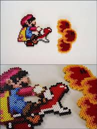 Articles Similaires A Super Mario World Mario On Red Yoshi Breathing Fire Magnet Sur Etsy Perler Bead Art Perler Bead Mario Perler Beads