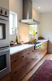 White Countertop With Walnut Dawn Wood Grain By Ikea And Semihandmade Modern Walnut Kitchen Kitchen Renovation Walnut Kitchen Cabinets