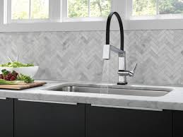 adding a sprayer to kitchen faucets by