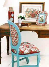 Unlike a slip cover that goes over the whole couch, using a blanket to create a tight stripe like the above photograph, or to only lay across the bottom cushions, or to only fold on the armrests, approaches the aesthetics of your couch in an intentional way, altering the shape and pattern of it, and maybe even altering the look. Brilliantly Creative Ways To Reupholster A Chair Furniture Chair Old Chairs