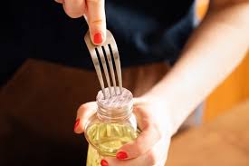 A vegetable oil is a triglyceride extracted from a plant. Vegetable Oil Bottle Fork Hack Kitchn
