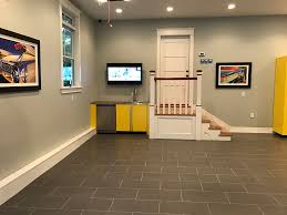 Garage cabinets, garage flooring, tool storage, overhead storage Porcelain Tile The Ideal Surface For Garage Flooring Vault Custom Garages