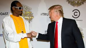 Snoop Dogg aims toy gun at clown dressed as Trump; Trump fires back in  tweet - ABC13 Houston