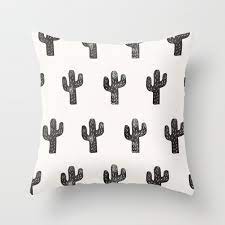 A single cactus flower in full bloom is set against a soft solid white back. Stamped Cactus Throw Pillow By Wesleybird Society6