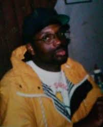 Suspect in custody in death of man found inside burning apartment